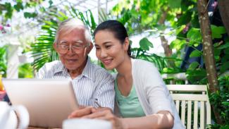 Elderly man and young lady